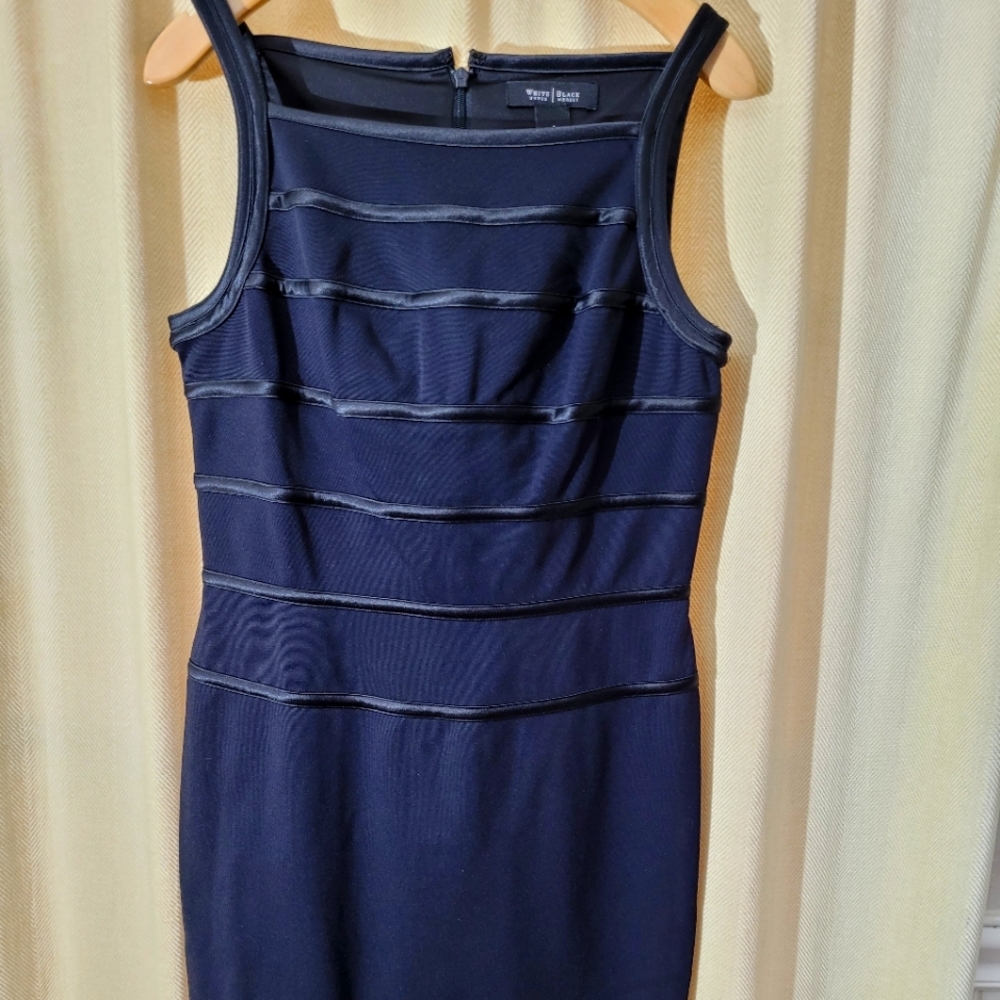 White House Black Market elegant black dress with stitched in black accents